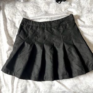 Black plaid skirt, size small.